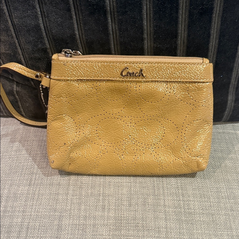 Coach Perforated Signature Gold Leather Wristlet